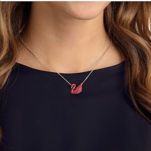 Swarovski Iconic Swan pendant, Red, Gold-tone plated